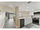 Modern kitchen with white cabinets, quartz countertops and stainless steel appliances at 1000 Gulf Blvd # 302, Indian Rocks Beach, FL 33785