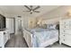 Spacious main bedroom with king-size bed and en-suite bathroom at 1000 Gulf Blvd # 302, Indian Rocks Beach, FL 33785