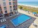 Community pool with jacuzzi and ocean views at 1000 Gulf Blvd # 302, Indian Rocks Beach, FL 33785