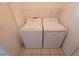 Functional laundry room with washer and dryer at 10232 Oakhurst Rd, Largo, FL 33774