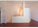 Open concept living room with view into dining area at 10232 Oakhurst Rd, Largo, FL 33774