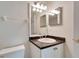 Bathroom features a vanity with granite countertop at 1050 Starkey Rd # 704, Largo, FL 33771