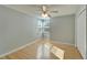 Charming bedroom with wood floors, ceiling fan and window at 1050 Starkey Rd # 704, Largo, FL 33771