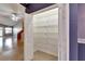 Walk-in closet with wire shelving for maximum storage and tile flooring at 1050 Starkey Rd # 704, Largo, FL 33771