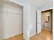 Spacious walk-in closet with shelving adjacent to a bright bathroom, offering plenty of storage at 1050 Starkey Rd # 704, Largo, FL 33771