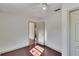 Bedroom with wood floors and doorway at 1100 E Louisiana Ave, Tampa, FL 33603