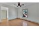 Bright bedroom with hardwood floors and exterior access at 1100 E Louisiana Ave, Tampa, FL 33603