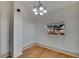 Dining room with hardwood floors and window at 1100 E Louisiana Ave, Tampa, FL 33603