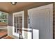 Front entrance with a white door and window at 1100 E Louisiana Ave, Tampa, FL 33603