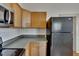 Close-up of kitchen cabinets and appliances at 1100 E Louisiana Ave, Tampa, FL 33603