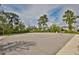 Outdoor basketball court with seating areas at 13230 Fawn Lily Dr, Riverview, FL 33579