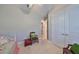 Simple bedroom with a daybed and a large closet at 13230 Fawn Lily Dr, Riverview, FL 33579