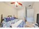 Guest bedroom with double bed and built-in closet at 13230 Fawn Lily Dr, Riverview, FL 33579