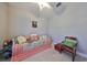 Cozy bedroom with a daybed and built-in closet at 13230 Fawn Lily Dr, Riverview, FL 33579