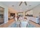 Open concept kitchen with island, stainless steel appliances, and white cabinetry at 13230 Fawn Lily Dr, Riverview, FL 33579