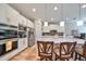 Modern kitchen with stainless steel appliances and an island at 13230 Fawn Lily Dr, Riverview, FL 33579