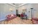 Bright home office features wood-look floors and decor at 13230 Fawn Lily Dr, Riverview, FL 33579