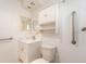 Bathroom with a walk-in shower and updated vanity at 14181 89Th Ave, Seminole, FL 33776