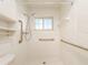 Walk-in shower with grab bars and updated vanity at 14181 89Th Ave, Seminole, FL 33776
