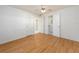 Laminate flooring and ceiling fan in this bright bedroom at 14181 89Th Ave, Seminole, FL 33776