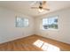 Bright bedroom with laminate flooring and large window at 14181 89Th Ave, Seminole, FL 33776