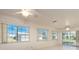 Sunlit dining area with tile floors and sliding glass doors to patio at 14181 89Th Ave, Seminole, FL 33776