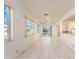 Bright dining area with tile floors and access to backyard at 14181 89Th Ave, Seminole, FL 33776