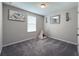 Cozy bedroom with gray carpet, a window, and teepee at 2408 E Chelsea St, Tampa, FL 33610