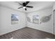 Bright bedroom with ceiling fan and hardwood floors at 2515 W Comanche Ave, Tampa, FL 33614