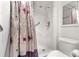 Bathroom with shower stall, grab bars, and toilet at 2650 Pearce Dr # 403, Clearwater, FL 33764