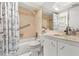 Bathroom with bathtub, vanity, and marble countertop at 2650 Pearce Dr # 403, Clearwater, FL 33764