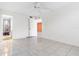 Bedroom with tile floors, ceiling fan, and access to bathroom at 2650 Pearce Dr # 403, Clearwater, FL 33764