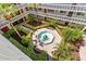 Community courtyard with a central fountain at 2650 Pearce Dr # 403, Clearwater, FL 33764