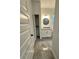 Bathroom with granite countertop and grey tile floor at 3208 Deleuil Ave, Tampa, FL 33610