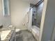 Bathroom with tub, shower, and granite countertop at 3208 Deleuil Ave, Tampa, FL 33610