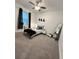Cozy bedroom with a full-size bed and large mirror at 3208 Deleuil Ave, Tampa, FL 33610