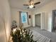 Bright bedroom with a double door closet and window at 3208 Deleuil Ave, Tampa, FL 33610