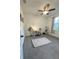 Bedroom with desk, chair and large window at 3208 Deleuil Ave, Tampa, FL 33610