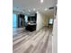 Modern kitchen with stainless steel appliances and granite countertops at 3208 Deleuil Ave, Tampa, FL 33610
