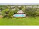 Community pool with surrounding landscape at 4904 Barnstead Dr, Riverview, FL 33578