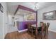 Charming dining room with a wooden table and chairs, adjacent to the kitchen at 4904 Barnstead Dr, Riverview, FL 33578