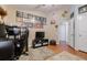 Spacious home office with wood flooring and ample space at 4904 Barnstead Dr, Riverview, FL 33578