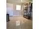 Bright entryway with tiled floors and a display cabinet at 5135 Gemstone Dr # 206, New Port Richey, FL 34652
