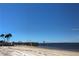 Community pier and sandy beach overlooking the water at 5135 Gemstone Dr # 206, New Port Richey, FL 34652