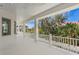 Beautiful bright balcony overlooking lush tropical landscaping and neighborhood views at 6189 Leeland S St, St Petersburg, FL 33715