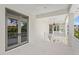 Charming white balcony with doors leading to an interior living space at 6189 Leeland S St, St Petersburg, FL 33715