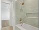 Luxurious bathroom with a tiled shower, soaking tub, and stylish fixtures creating a spa-like experience at 6189 Leeland S St, St Petersburg, FL 33715