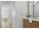 Stylish bathroom with a modern vanity, white countertop, and decorative mirror, creating a spa-like feel at 6189 Leeland S St, St Petersburg, FL 33715