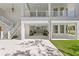 Open air, multi-level structure with stairs, covered parking and tropical plantings at 6189 Leeland S St, St Petersburg, FL 33715