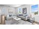 Inviting living room with comfortable seating, stylish decor, and plenty of natural light at 6189 Leeland S St, St Petersburg, FL 33715